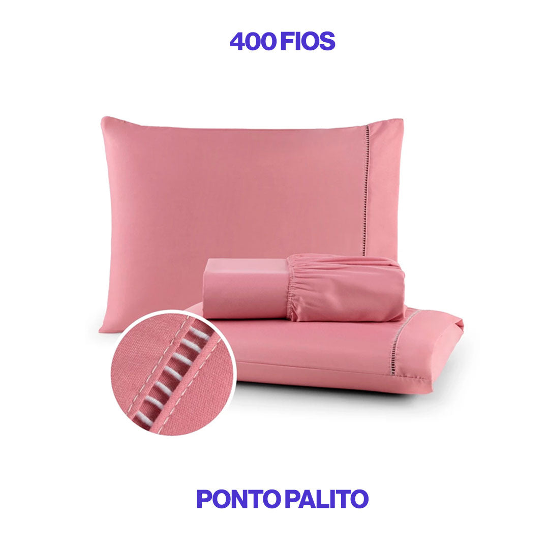 Conjunto de lençol de micropercal 400 fios disponível nas cores branca, bege e preta. Inclui lençol com elástico e fronhas com detalhe em ponto palito, trazendo sofisticação e conforto ao quarto.