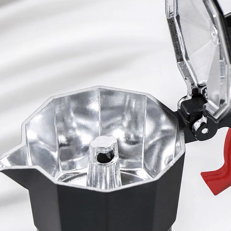 Cafeteira Italiana tradicional em alumínio com detalhes em vermelho. Prepara até 6 xícaras de 50ml com eficiência e segurança. Design moderno, leve e ergonômico, ideal para café espresso intenso em casa.