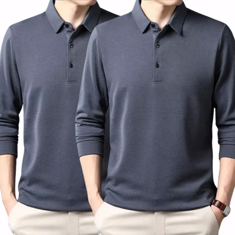 Camisa polo masculina manga longa com tecido leve, toque frio e acabamento refinado. Ideal para compor looks casuais ou formais, disponível em cores sóbrias como preto, azul, cinza e gelo.