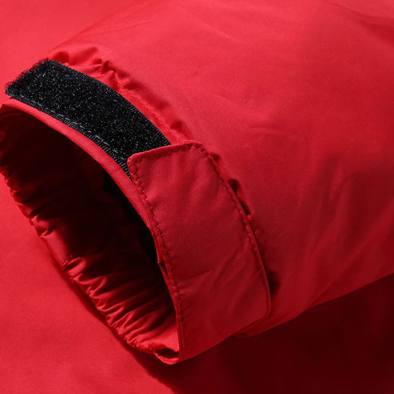 Jaqueta masculina forrada com capuz, bolsos com zíper e isolamento térmico para até -30°C. Ideal para neve, frio extremo e uso esportivo ou urbano com estilo e proteção.