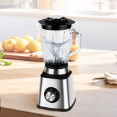 Liquidificador em aço inox com copo de vidro de 1,5L, 6 lâminas afiadas, botão giratório e função autolimpante. Acompanha jarra de moagem. Ideal para receitas, sucos e grãos.