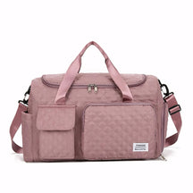 Mala de mão pequena para viagem com compartimento separado para calçados, acabamento acolchoado, alça tiracolo removível e múltiplos bolsos. Compacta e versátil.