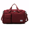 Mala de mão pequena para viagem com compartimento separado para calçados, acabamento acolchoado, alça tiracolo removível e múltiplos bolsos. Compacta e versátil.
