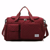 Mala de mão pequena para viagem com compartimento separado para calçados, acabamento acolchoado, alça tiracolo removível e múltiplos bolsos. Compacta e versátil.