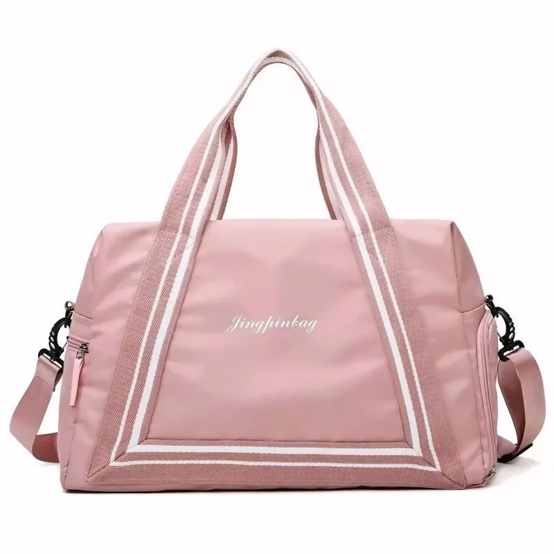Bolsa de viagem compacta e leve, ideal como mala de mão. Com alças duplas, tiracolo ajustável, bolso lateral e design moderno. Unissex e enviada em cores variadas.