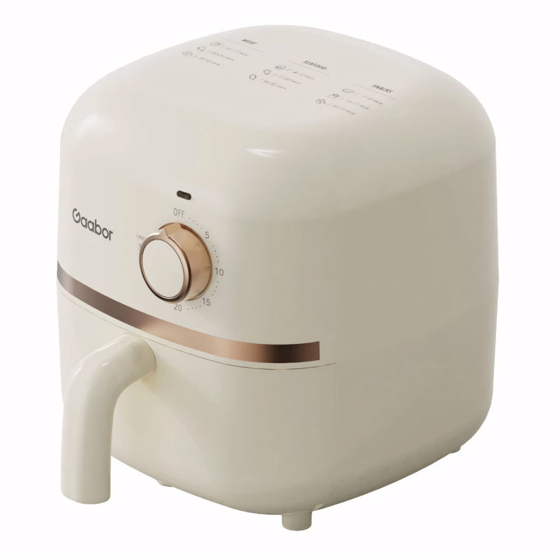 Fritadeira elétrica Gaabor com 1,4 litros, acabamento sofisticado em creme com detalhes dourados, timer analógico e tecnologia Cyclone Air para receitas crocantes sem óleo.
