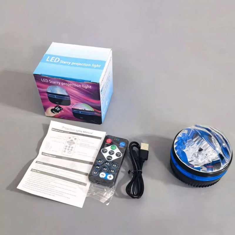 Projetor giratório LED compacto, com rotação 360°, controle remoto e efeitos de luz que simulam aurora boreal e ondas do mar. Ideal para relaxamento e decoração.