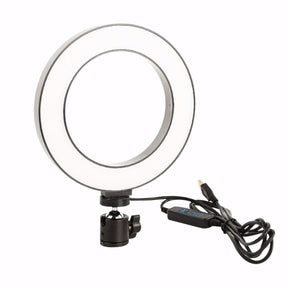 Ring Light LED 10 polegadas com tripé de mesa, controle embutido no cabo, suporte para celular centralizado e conexão USB. Ideal para fotos, vídeos, maquiagem e chamadas.