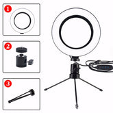 Ring Light LED 10 polegadas com tripé de mesa, controle embutido no cabo, suporte para celular centralizado e conexão USB. Ideal para fotos, vídeos, maquiagem e chamadas.