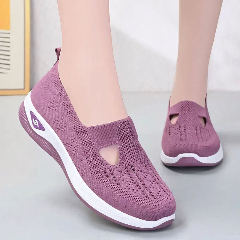 Tênis ortopédico feminino com solado de amortecimento, tecido respirável e palmilha anatômica. Ideal para alívio de dores nos pés e conforto prolongado com estilo leve e moderno.