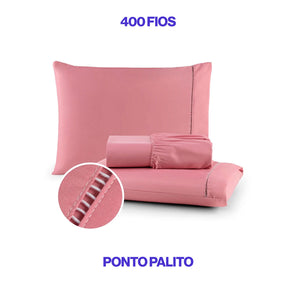 Conjunto de lençol de micropercal 400 fios disponível nas cores branca, bege e preta. Inclui lençol com elástico e fronhas com detalhe em ponto palito, trazendo sofisticação e conforto ao quarto.