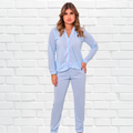 Pijama feminino de inverno composto por blusa de manga longa com botões e calça com elástico. Confeccionado em malha PV leve e respirável, perfeito para noites frias com conforto e estilo. Disponível nas cores azul claro, preto e vinho.